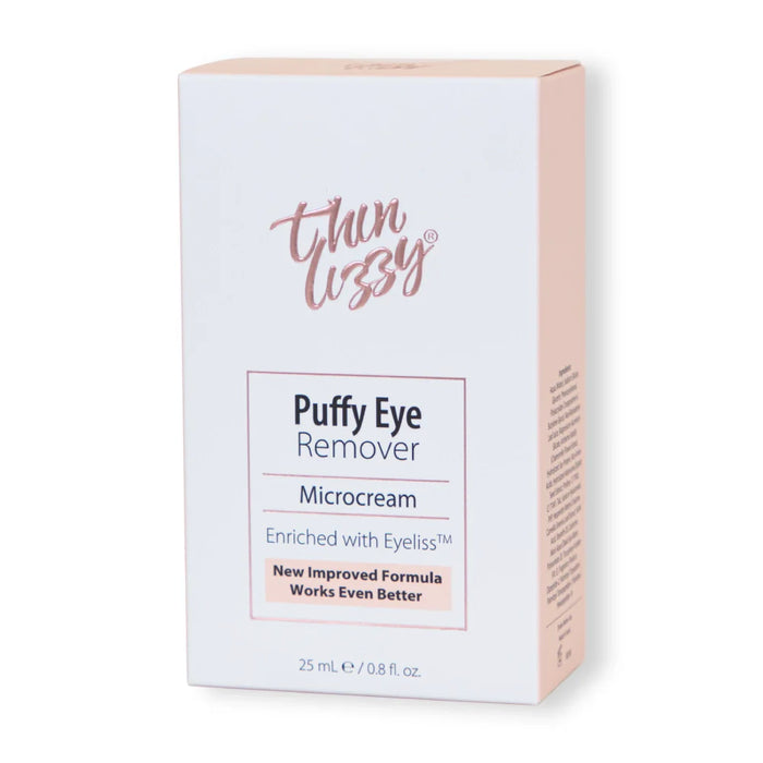 The image shows the retail packaging of Thin Lizzy Puffy Eye Remover Microcream (25 mL / 0.8 fl. oz.), a cosmetic product designed to reduce under-eye puffiness, dark circles, and wrinkles.